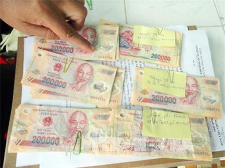 Khởi tố 7 đối tượng buôn tiền giả từ Trung Quốc
