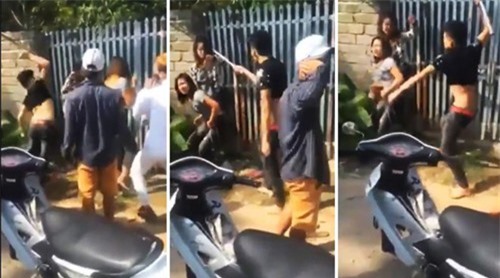  Nhóm thanh niên cầm gậy sắt đánh nữ sinh dã man để "dằn mặt"