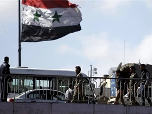 Nhóm phiến quân cuối cùng rời khỏi thành phố Homs ở Syria