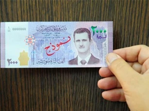Assad bất ngờ "có mặt" trên tiền Syria sau 17 năm cầm quyền