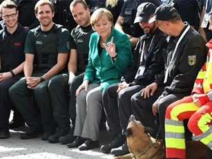 Trump khen Merkel giải quyết êm thấm hội nghị G20