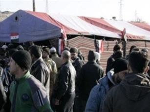Hàng loạt khủng bố đầu hàng quân đội Syria ở Đông Ghouta