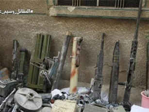 Chùm ảnh: Quân đội Syria chiếm kho vũ khí của IS
