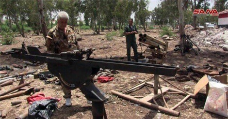 Chùm ảnh: Quân đội Syria giành chiến lợi phẩm ở Bắc Homs