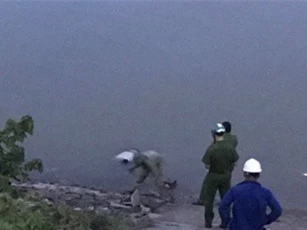 Phát hiện người đàn ông chết, nổi trên sông Lam