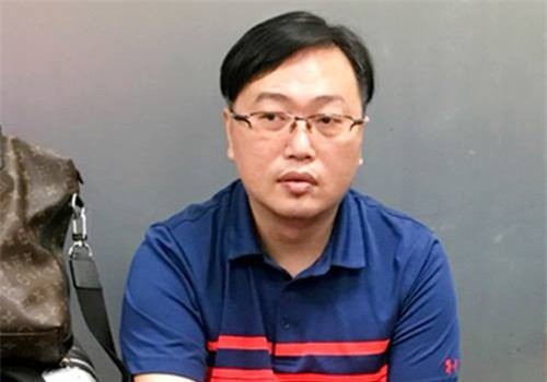 Nghi can đưa hối lộ tại Trung Quốc bị bắt khi trốn ở Việt Nam