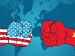 Ngành ngân hàng đang "thấm" cuộc chiến thương mại của ông Trump